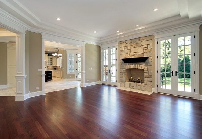 stunning acacia wood flooring in a luxurious master bedroom